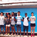 GIS students standing outside the newly painted classrooms.