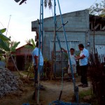 The drill rigs set up in Sitios Cogon and Sta. Cruz, Tapilon.  The rope is pulled tight, which lifts the driver high above the ground